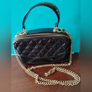 Elegant Black Quilted Handbag with Gold Chain